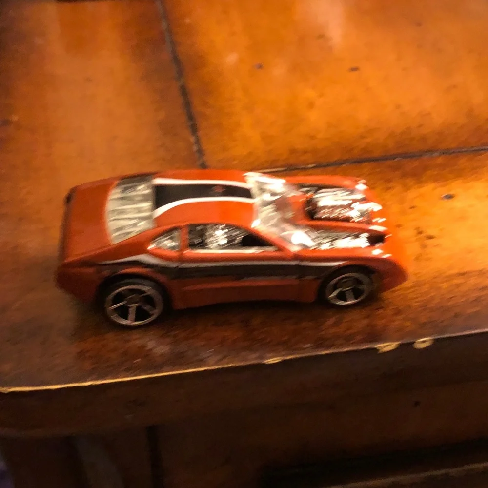 Orange Toy Muscle Car with Exposed Engine